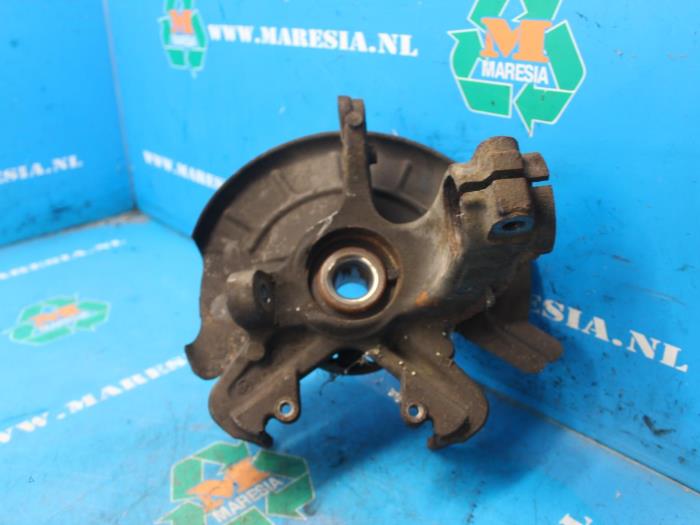 Knuckle, front left from a Skoda Fabia II (5J) 1.2i 2010