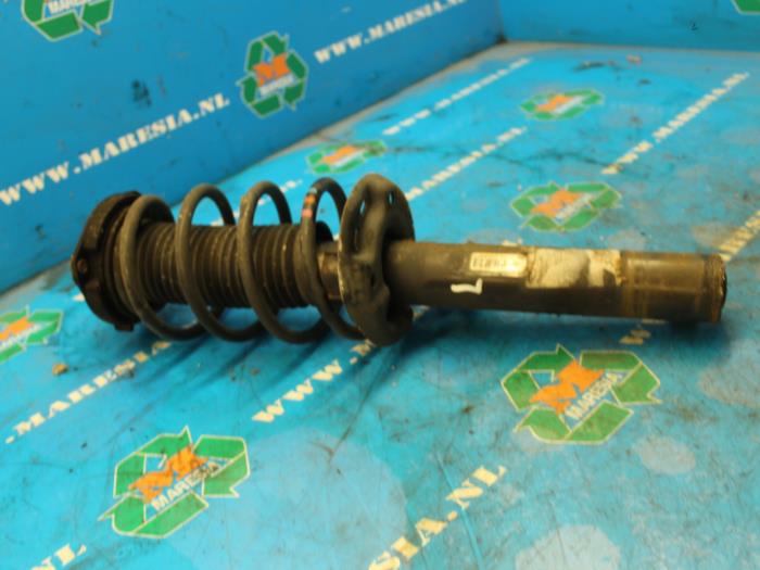 Front shock absorber rod, left from a Volkswagen Eos (1F7/F8) 2.0 FSI 16V 2007