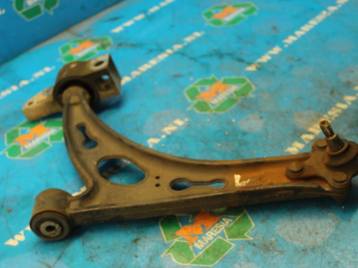 Front lower wishbone, left from a Volkswagen Eos (1F7/F8) 2.0 FSI 16V 2007