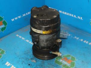 Used Air conditioning pump Opel Tigra (75) 1.4i 16V Price € 36,75 Margin scheme offered by Maresia Auto Recycling B.V.