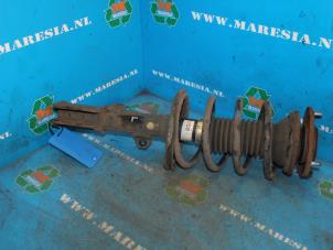 Used Front shock absorber rod, left Toyota Corolla (E12) 1.6 16V VVT-i Price € 42,00 Margin scheme offered by Maresia Auto Recycling B.V.