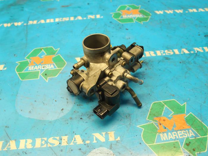Gebrauchte Drosselklappengehäuse Daihatsu Cuore (L251/271/276) 1.0 12V DVVT Preis € 52,50 Margenregelung angeboten von Maresia Auto Recycling B.V.