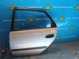 Usagé Porte arrière gauche Toyota Avensis Prix € 105,00 Règlement à la marge proposé par Maresia Auto Recycling B.V.