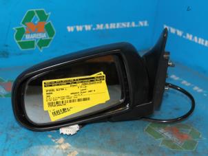 Used Wing mirror, left Mazda 323 (BA12) 1.5i 16V Price € 36,75 Margin scheme offered by Maresia Auto Recycling B.V.