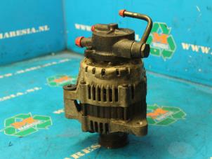 Dynamo från en Kia Carens II (FJ) 2.0 CRDI 16V 2003