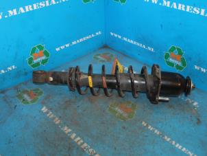 Used Rear shock absorber rod, left Toyota Corolla (E12) 1.4 16V VVT-i Price € 36,75 Margin scheme offered by Maresia Auto Recycling B.V.