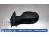 Wing mirror, left from a Nissan Micra (K12) 1.2 16V 2009