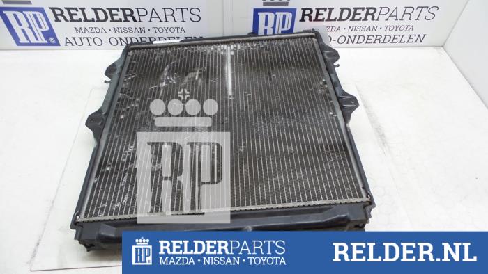 Radiator from a Toyota Hilux III 2.5 D4-D 100 16V 4x4 2003