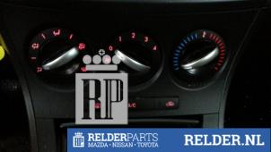 Używane Panel sterowania nagrzewnicy Mazda 3 (BL12/BLA2/BLB2) 1.6 CiTD 16V Cena € 75,00 Procedura marży oferowane przez Relder Parts B.V.