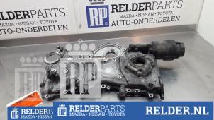 Używane Obudowa rozrzadu Toyota Corolla Verso (R10/11) 2.2 D-4D 16V Cena € 68,00 Procedura marży oferowane przez Relder Parts B.V.