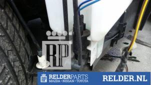 Used Windscreen washer pump Nissan Note (E12) 1.2 68 Price € 23,00 Margin scheme offered by Relder Parts B.V.