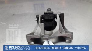 Używane Wspornik silnika Mazda 2 (DJ/DL) 1.5 SkyActiv-G 90 Cena € 50,00 Procedura marży oferowane przez Relder Parts B.V.