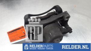 Used Front brake calliper, right Nissan Pulsar (C13) 1.2 DIG-T 16V Price € 40,00 Margin scheme offered by Relder Parts B.V.