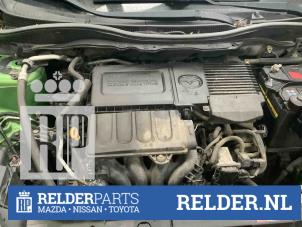 Używane Obudowa filtra powietrza Mazda 2 (DE) 1.3 16V S-VT Cena € 30,00 Procedura marży oferowane przez Relder Parts B.V.