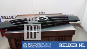 Used Grille Mazda Demio (DW) 1.5 16V Price € 35,00 Margin scheme offered by Relder Parts B.V.