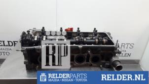 Used Cylinder head Toyota Avensis Verso (M20) 2.0 16V VVT-i D-4 Price on request offered by Relder Parts B.V.