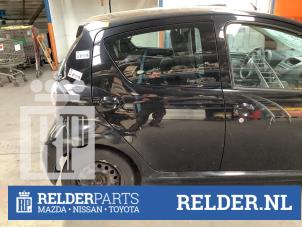 Usagé Porte arrière droite Toyota Aygo (B10) 1.0 12V VVT-i Prix € 100,00 Règlement à la marge proposé par Relder Parts B.V.