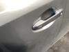 Door handle 4-door, front left from a Toyota Auris (E18) 1.8 16V Hybrid 2013