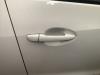 Manija de puerta de 4 puertas derecha delante de un Mazda 2 (DJ/DL) 1.5 SkyActiv-G 90 2015