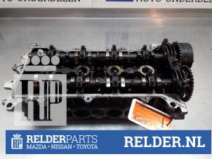Used Cylinder head Toyota Corolla Verso (R10/11) 1.8 16V VVT-i Price on request offered by Relder Parts B.V.