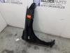 Front wing, right from a Mazda 2 (NB/NC/ND/NE) 1.4 16V 2004