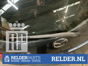 Usagé Bras essuie-glace arrière Mazda 2 (DE) 1.3 16V S-VT Prix € 15,00 Règlement à la marge proposé par Relder Parts B.V.