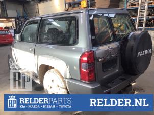 Luftmengenmesser van een Nissan Patrol GR (Y61) 3.0 GR Di Turbo 16V 2009