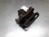 Rear brake calliper, left from a Nissan Patrol GR (Y61) 3.0 GR Di Turbo 16V 2009