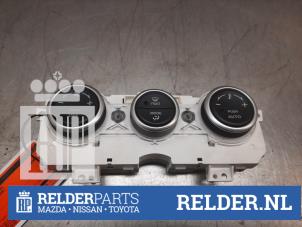 Usados Panel de control de calefacción Mazda 6 (GG12/82) 1.8i 16V Precio € 45,00 Norma de margen ofrecido por Relder Parts B.V.