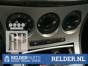 Używane Panel sterowania nagrzewnicy Mazda 3 Sport (BL14/BLA4/BLB4) 1.6i MZR 16V Cena € 50,00 Procedura marży oferowane przez Relder Parts B.V.