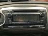 Radio CD player from a Toyota Yaris III (P13), 2010 / 2020 1.0 12V VVT-i, Hatchback, Petrol, 998cc, 51kW (69pk), FWD, 1KRFE, 2010-12 / 2020-06, KSP13 2013