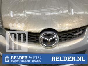 Used Grille Mazda CX-7 2.3 MZR DISI Turbo 16V AWD Price € 45,00 Margin scheme offered by Relder Parts B.V.