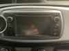 Radio CD player from a Toyota Yaris III (P13) 1.5 16V Hybrid 2013