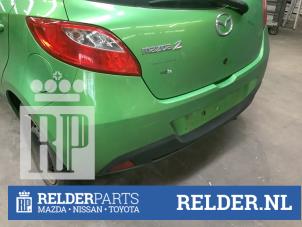 Gebrauchte Stoßstange hinten Mazda 2 (DE) 1.4 CDVi 16V Preis € 90,00 Margenregelung angeboten von Relder Parts B.V.