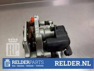 Gebrauchte Bremszange rechts hinten Toyota Yaris Cross (PB1/PJ1) 1.5 12V Hybrid 115 Preis € 75,00 Margenregelung angeboten von Relder Parts B.V.