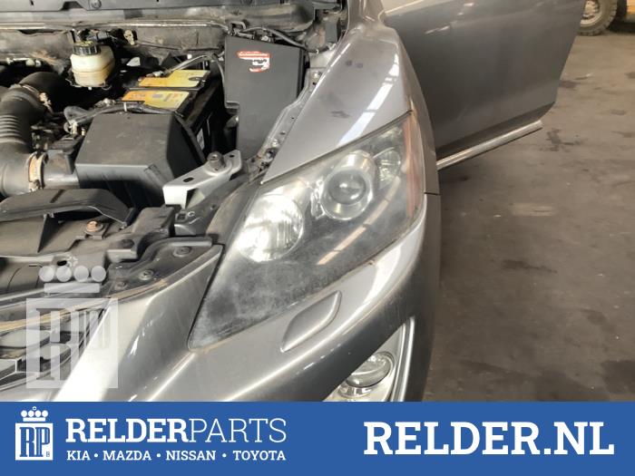 Używane Reflektor lewy Mazda CX-7 2.2 MZR-CD 16V Cena € 300,00 Procedura marży oferowane przez Relder Parts B.V.