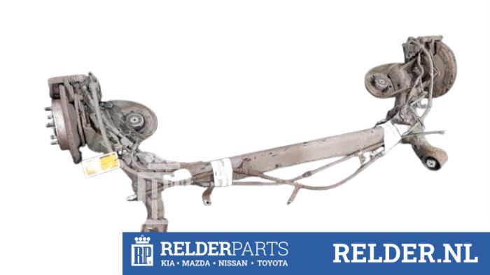 Gebrauchte Hinterachse Vorderradantrieb Kia Venga 1.4 CVVT 16V Preis € 175,00 Margenregelung angeboten von Relder Parts B.V.