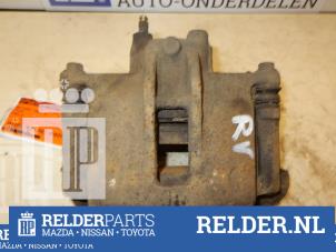 Używane Zacisk hamulcowy prawy przód Toyota Corolla (E12) 1.4 16V VVT-i Cena € 30,00 Procedura marży oferowane przez Relder Parts B.V.