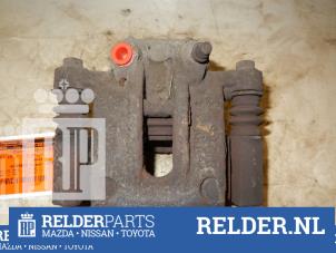 Used Rear brake calliper, left Toyota Corolla (E12) 1.4 D-4D 16V Price € 30,00 Margin scheme offered by Relder Parts B.V.