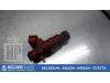 Injector (petrol injection) from a Nissan Primera (P12) 1.8 16V 2005