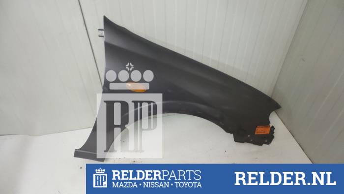 Front wing, right from a Nissan Almera (N16) 1.8 16V 2005