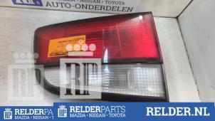 Used Taillight, left Mazda 626 (GW19) 2.0i 16V HiPower Price € 23,00 Margin scheme offered by Relder Parts B.V.