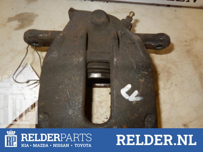 Gebrauchte Bremszange links vorne Nissan Micra (K12) 1.2 16V Preis € 25,00 Margenregelung angeboten von Relder Parts B.V.