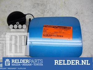 Używane Pokrywa wlewu paliwa Nissan Almera (N16) 1.5 16V Cena € 18,00 Procedura marży oferowane przez Relder Parts B.V.