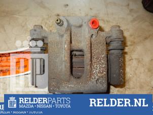 Used Rear brake calliper, right Toyota Corolla (E12) 1.4 16V VVT-i Price € 30,00 Margin scheme offered by Relder Parts B.V.