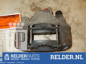 Used Front brake calliper, left Mazda Demio (DW) 1.3 16V Price € 45,00 Margin scheme offered by Relder Parts B.V.