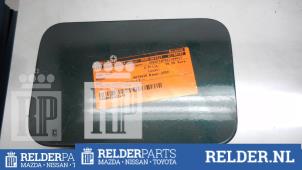 Usados Tapa de depósito Mazda 626 (GF14) 2.0i 16V Precio € 18,00 Norma de margen ofrecido por Relder Parts B.V.
