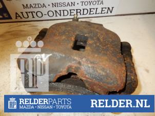 Used Front brake calliper, right Nissan Primera (P11) 1.6 16V Price € 45,00 Margin scheme offered by Relder Parts B.V.