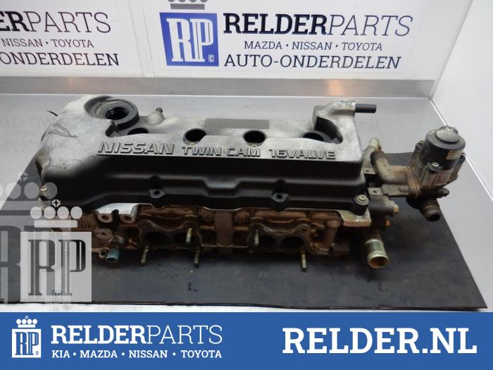 Begagnade Topplock Nissan Almera (N16) 1.5 16V Pris € 135,00 Marginaltabell erbjuds av Relder Parts B.V.