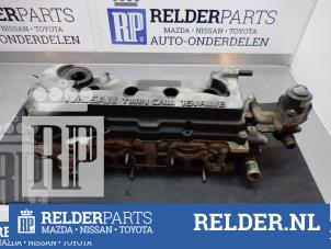 Używane Glowica cylindra Nissan Almera (N16) 1.5 16V Cena € 135,00 Procedura marży oferowane przez Relder Parts B.V.